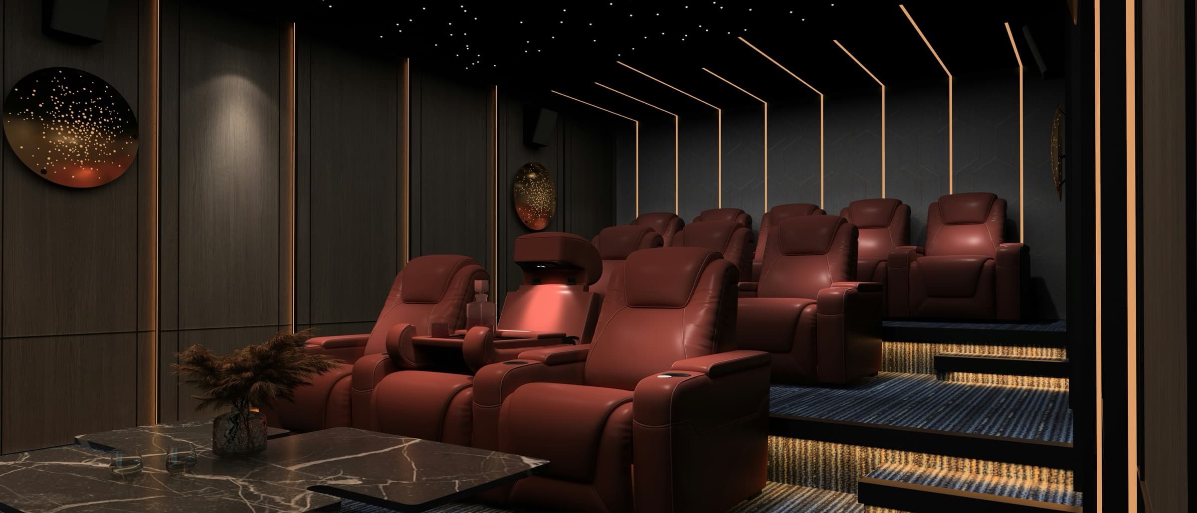 Luxury home theater with red recliners under a starlit ceiling